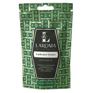 A 4 oz (113g) pouch labeled Embrace Grace Bath Salts features a green pattern and claims to offer a balanced combination of energy, relaxation, and wellness.