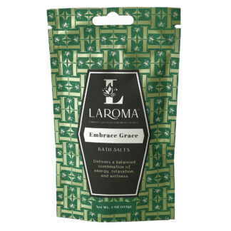 A 4 oz (113g) pouch labeled Embrace Grace Bath Salts features a green pattern and claims to offer a balanced combination of energy, relaxation, and wellness.