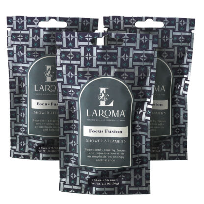 Three packets of LAROMA Focus Fusion Shower Steamers, featuring a dark geometric design with white and light blue accents, standing upright and overlapping each other against a white background.
