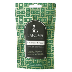 A green and white patterned resealable pouch labeled Dream Haven Shower Steamers (CBD Isolates) claims to provide a balanced blend of energy, relaxation, and wellness. Net weight: 2.3 oz (70g).