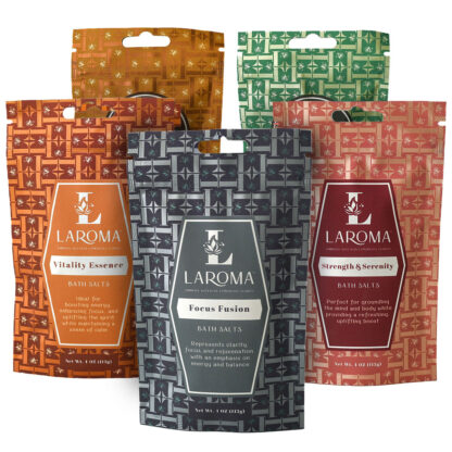 Four vibrant Bath Salt 5-Pack Combo packages stand upright, each with a unique pattern and label: Vitality Essence (orange), Focus Fusion (gray), Strength & Serenity (red), and Inspire Balance (green).